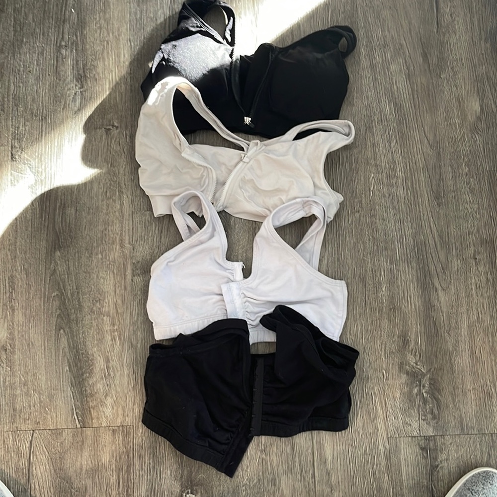 Zip up and eye hook bras